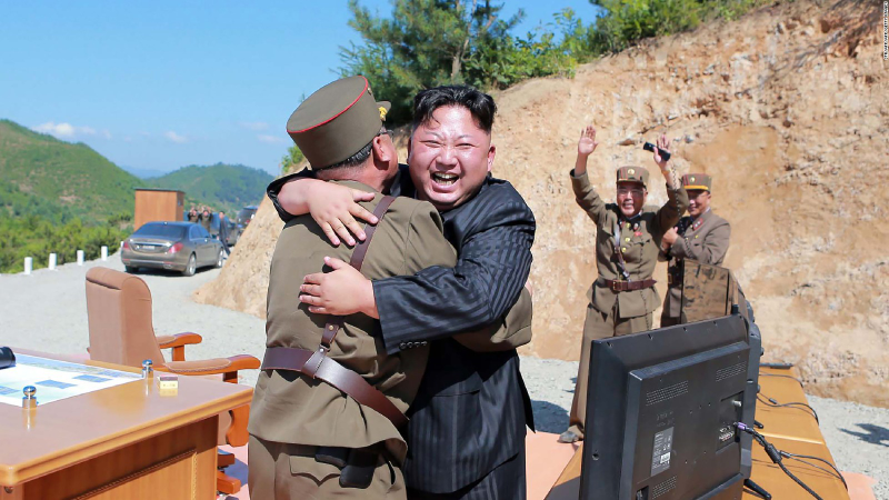 A jubilant Kim Jung Un celebrates the July 4, 2017 launch of the Hwasong-14 ICBM. KNCA photo